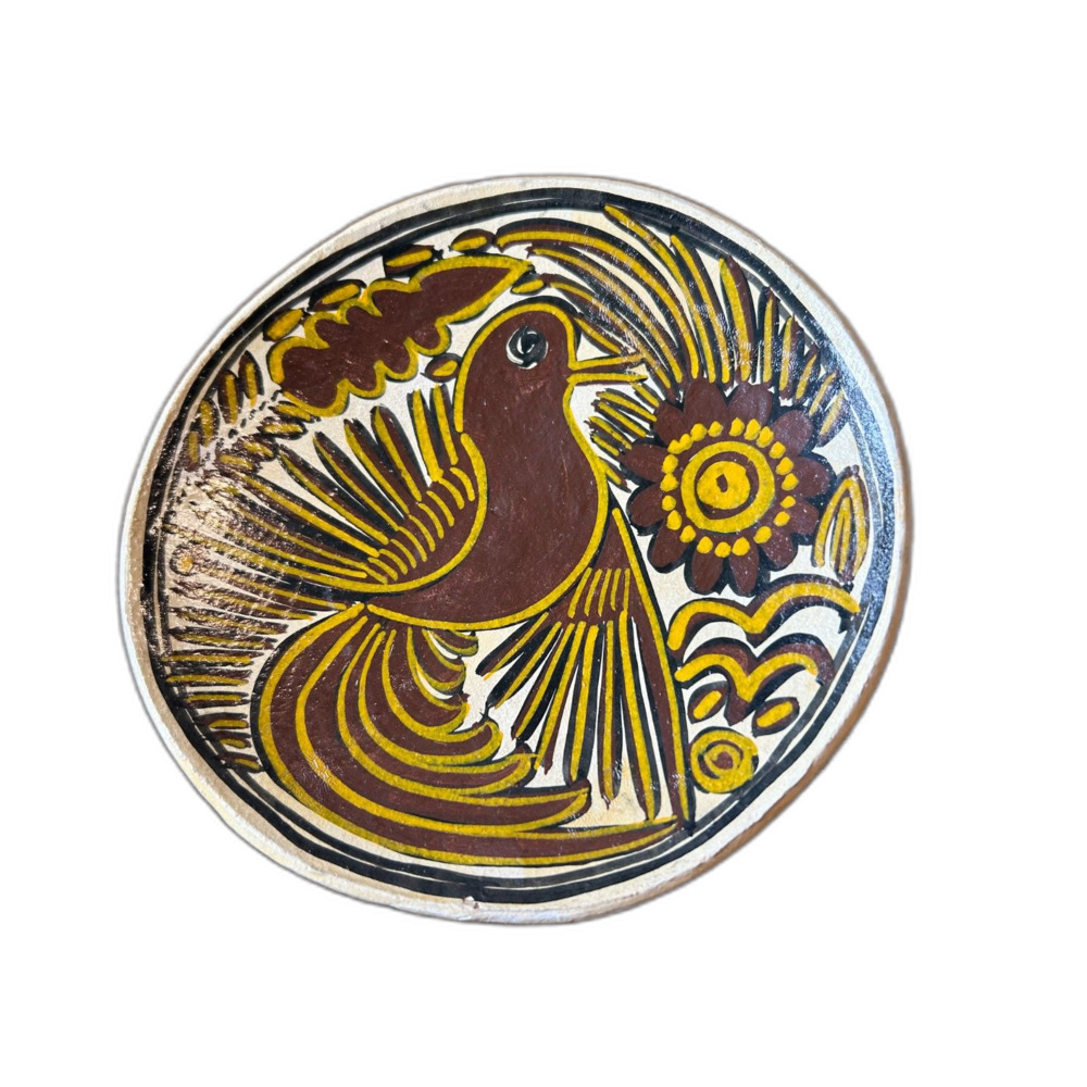 Vintage handmade bird motif pottery plate in rich brown and yellow 5.5"